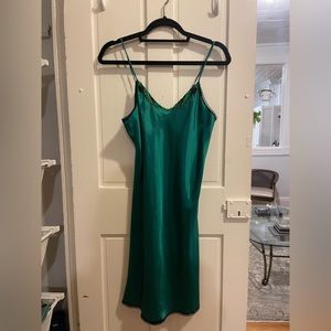 Green satin slip dress with embroidered detail